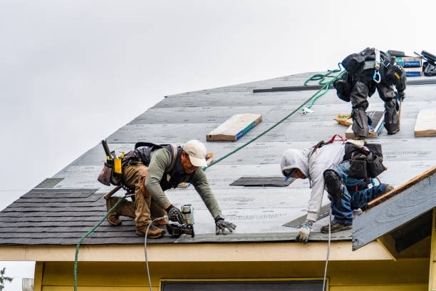 Professional Gutter Installation technician working in Madill, OK